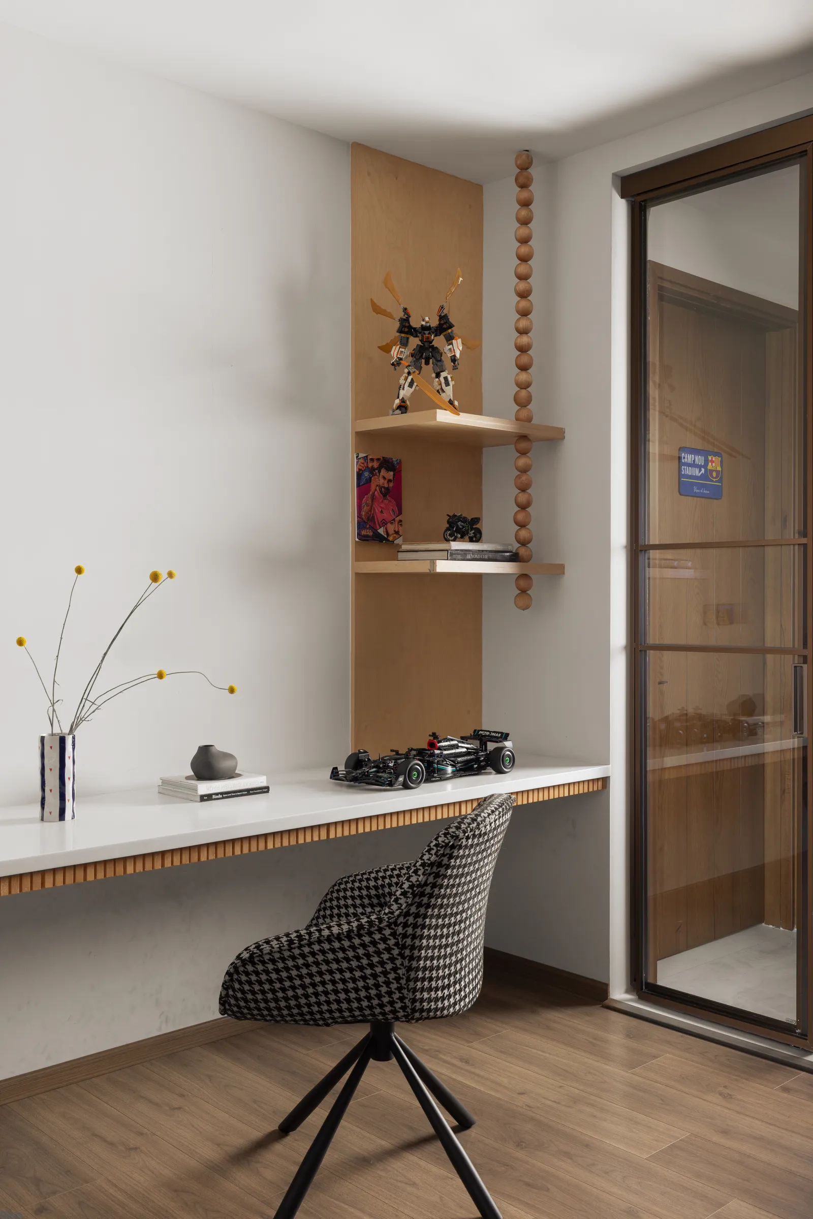Study desk with open shelving and glass door — Seema Katta Svasa